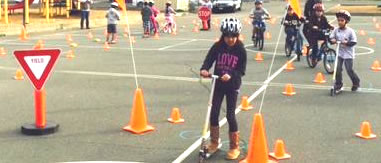 Kids Riding Through Safety Cones